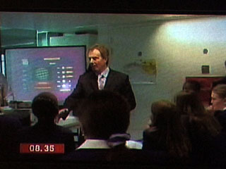 Tony Blair with Planet 10 in the background